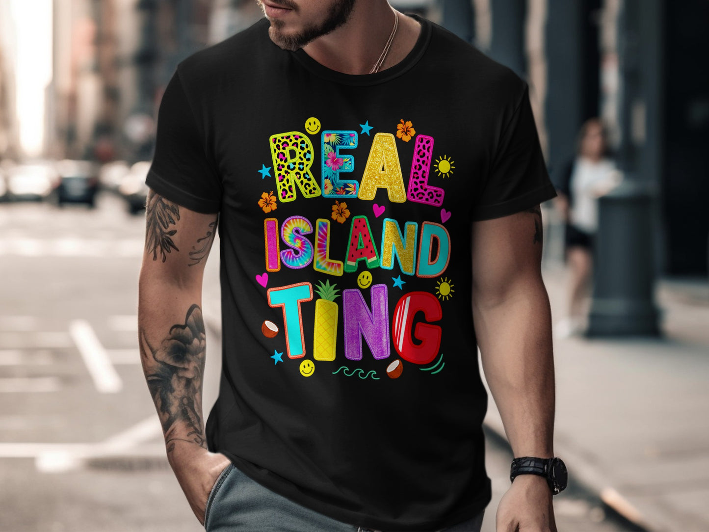 Black t-shirt with colorful "Real Island Ting" text and vibrant patterns.