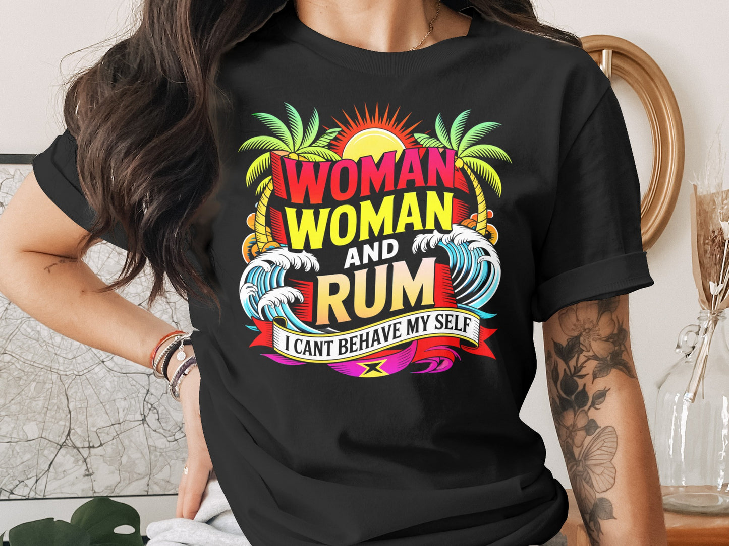 Black t-shirt with "Woman Woman and Rum I Can't Behave Myself" graphic.