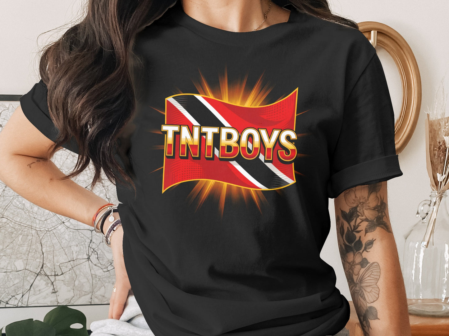 Black t-shirt with TNTBOYS logo in a sunburst design.