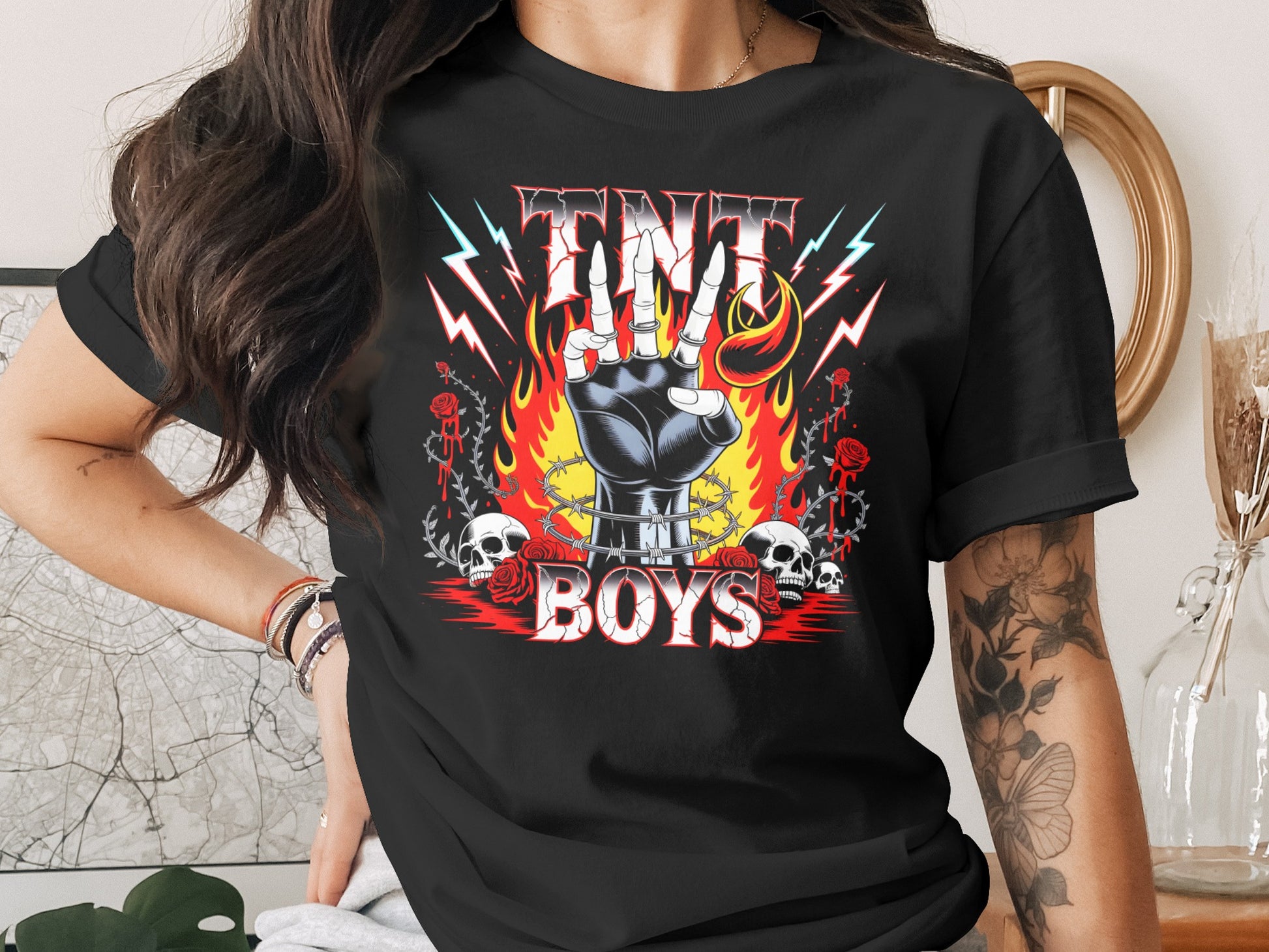 Black t-shirt with fiery "TNT BOYS" logo, skull, and crossed bones graphic.