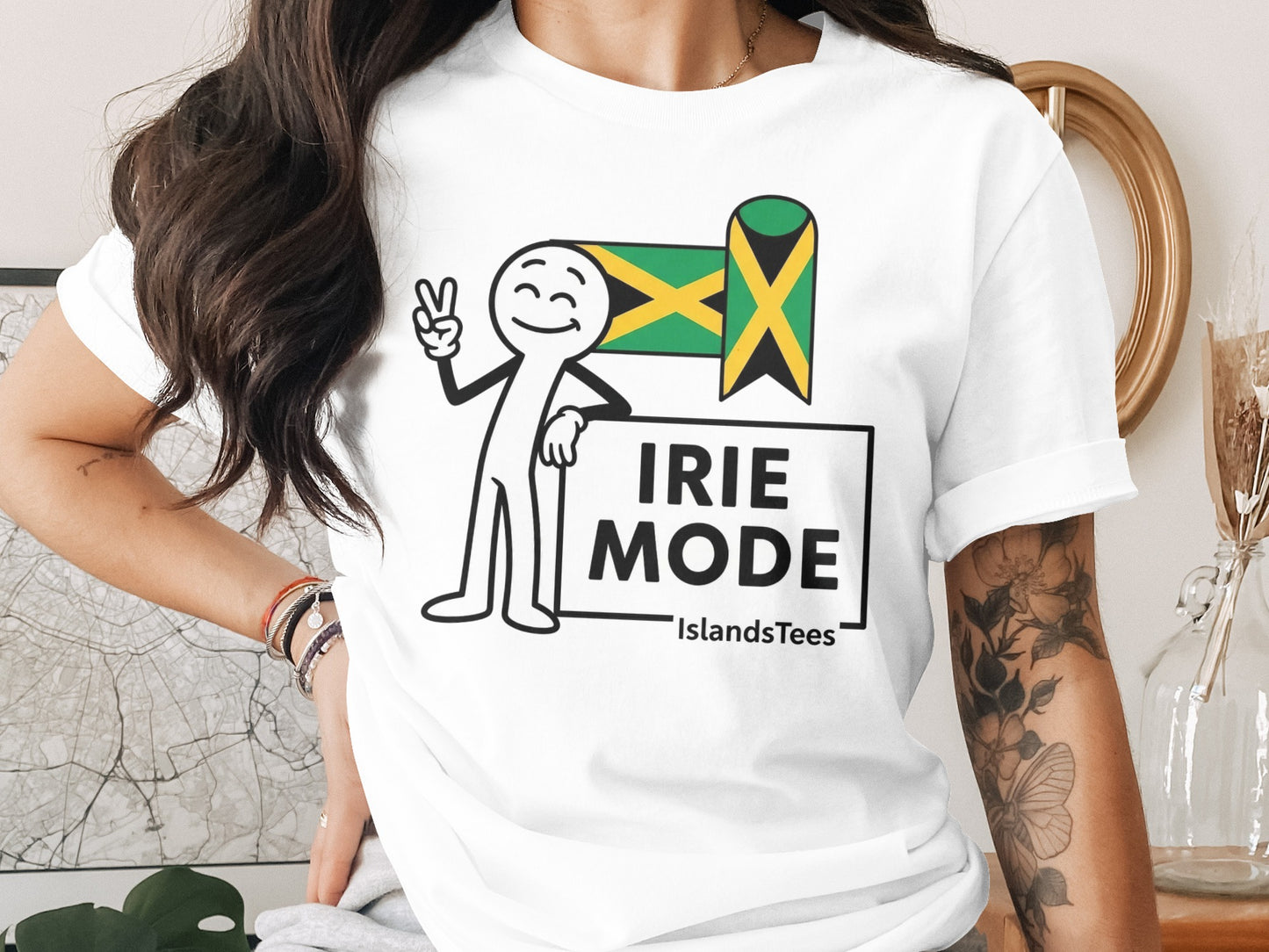 T-shirt with cartoon figure holding Jamaican flag and "IRIE MODE" text.