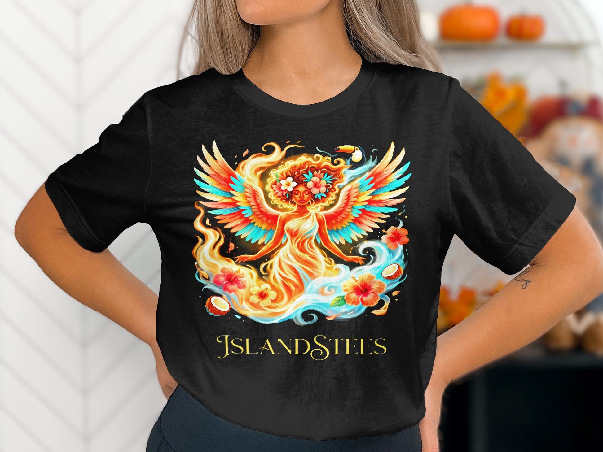 Black t-shirt with fiery winged woman and floral design.