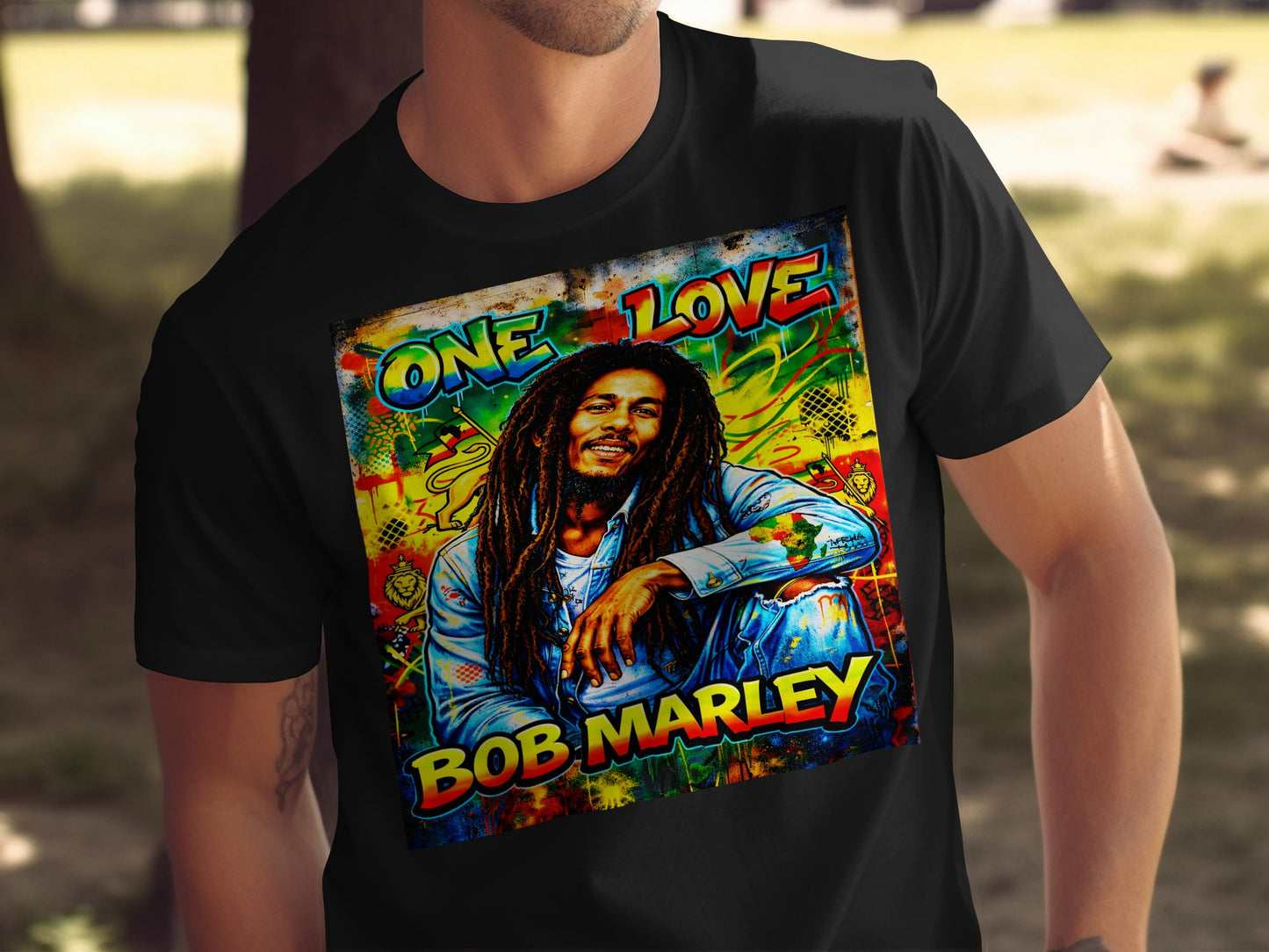 Bob Marley "One Love" graphic t-shirt with vibrant background.