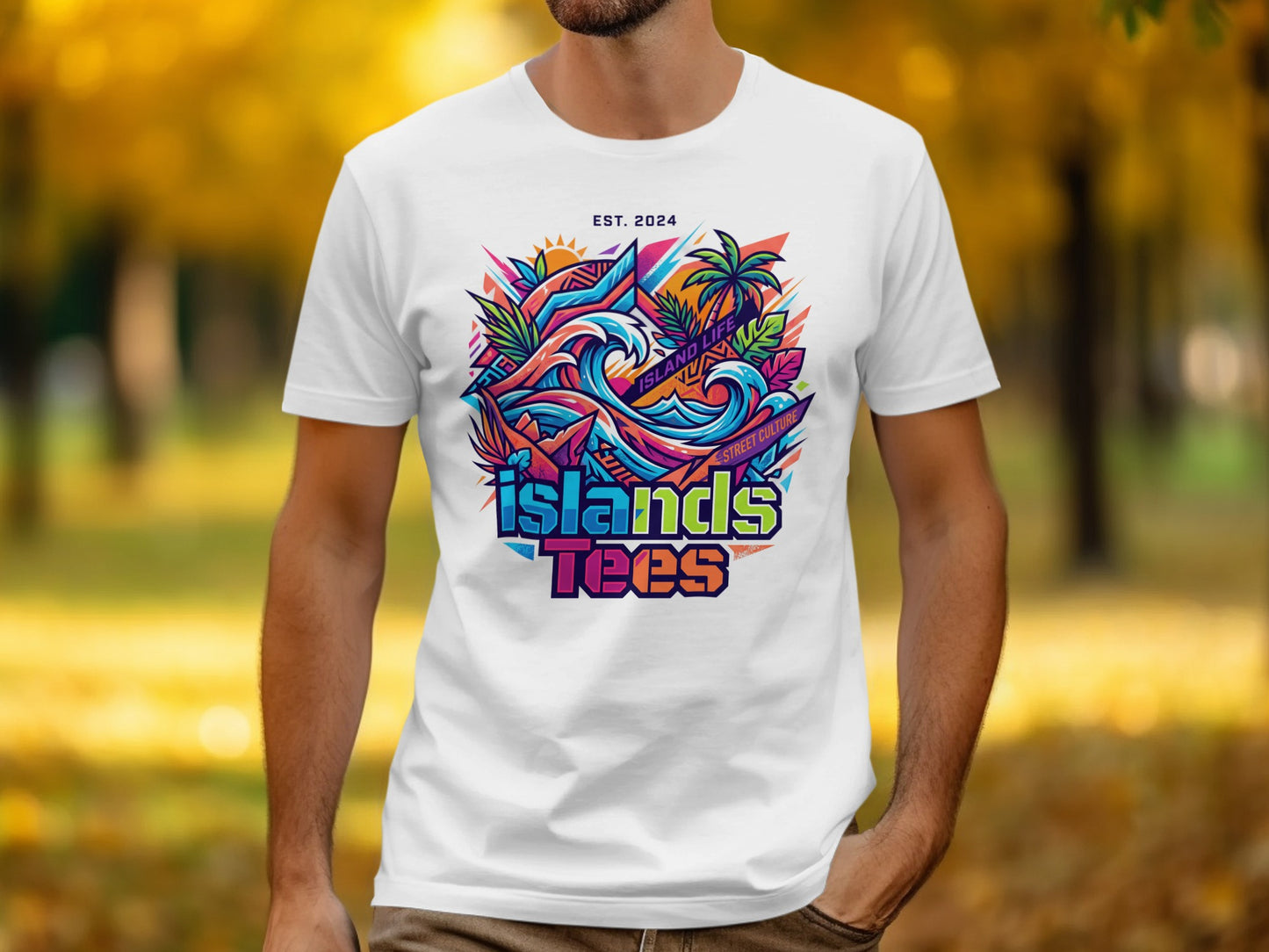 White t-shirt with vibrant "Island Tees" logo featuring waves, palm trees, and "Est. 2024".