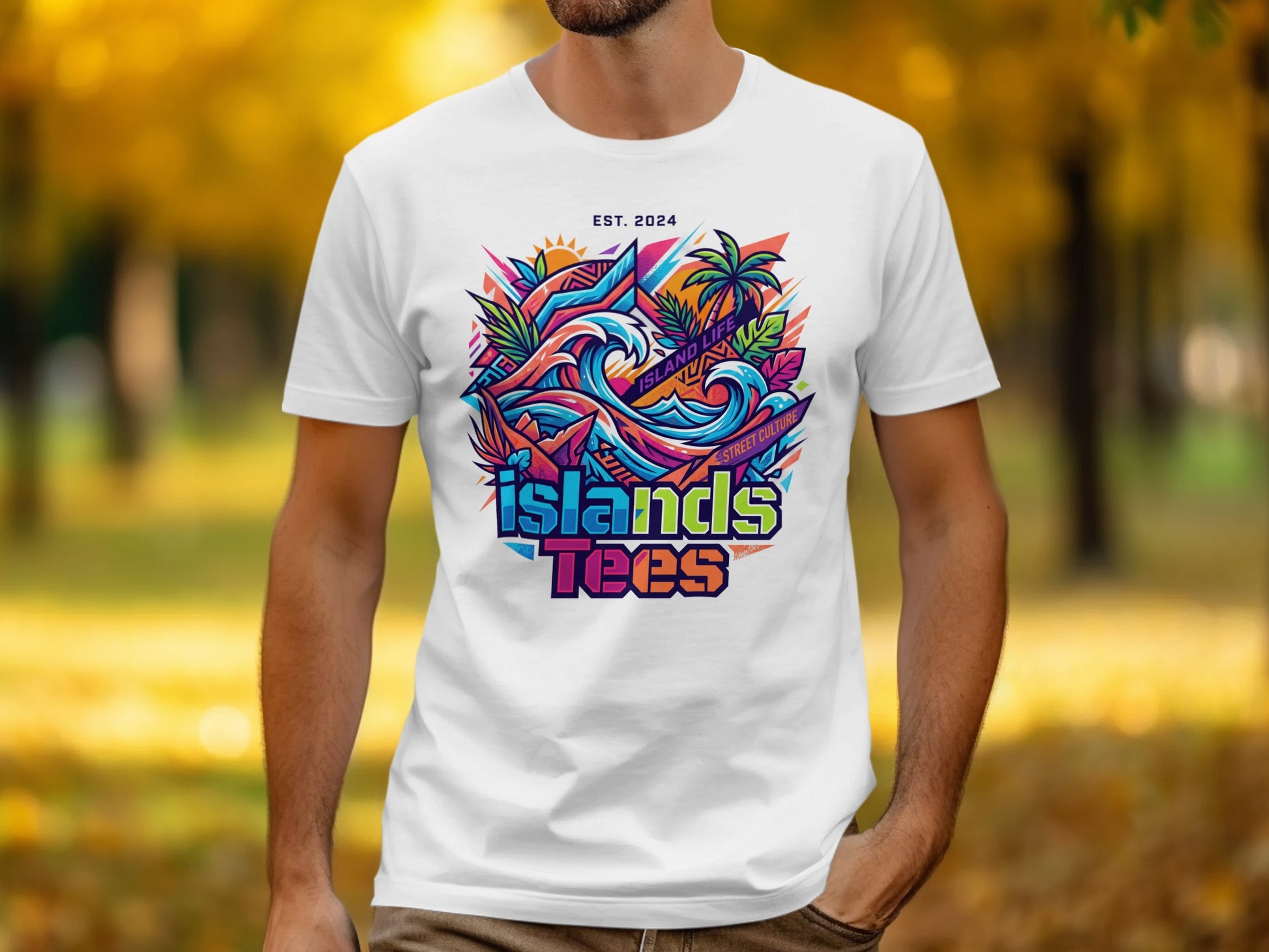 White t-shirt with vibrant "Island Tees" logo featuring waves, palm trees, and "Est. 2024".