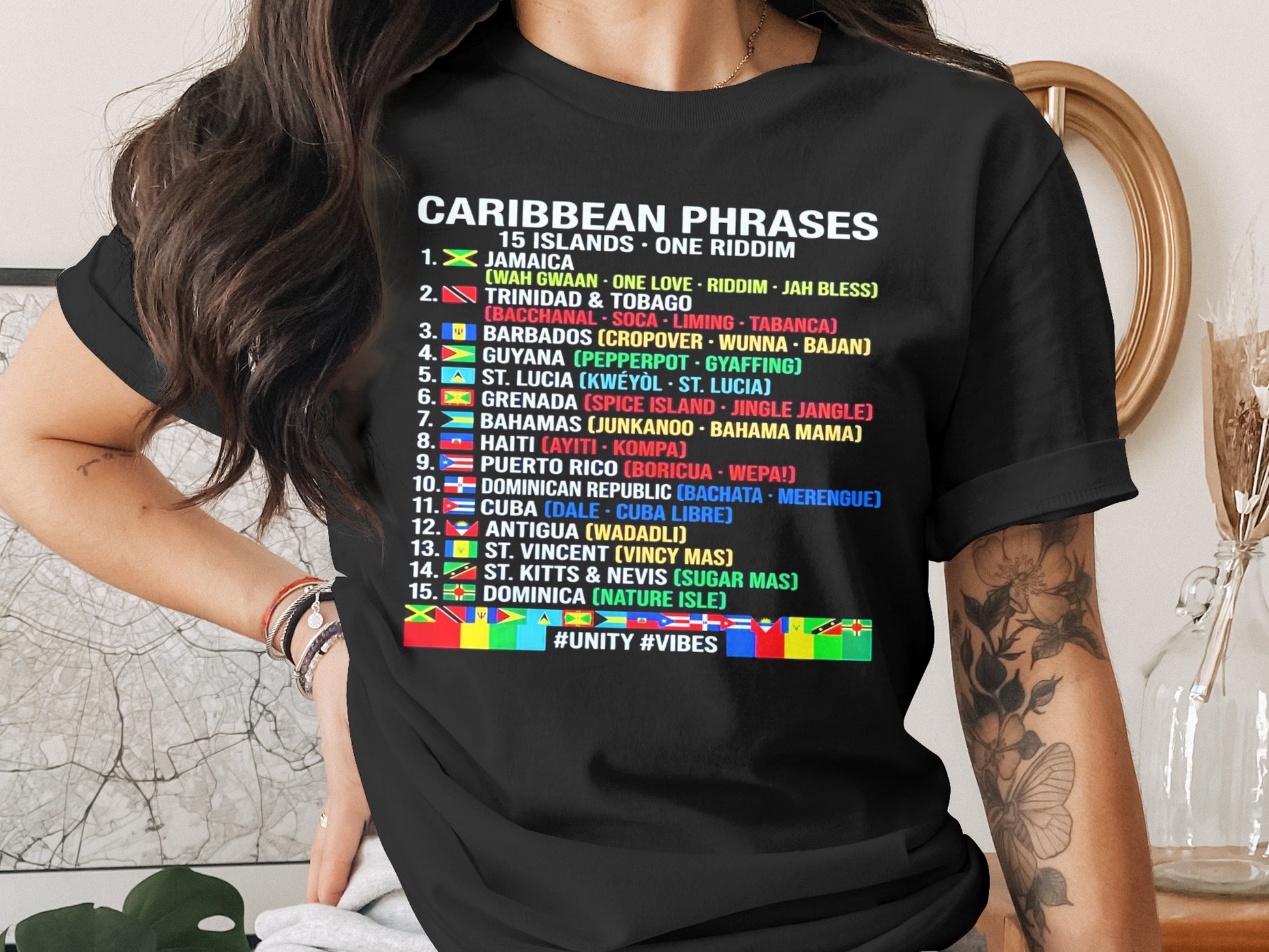 Black t-shirt with "Caribbean Phrases" and a list of islands with associated slang.