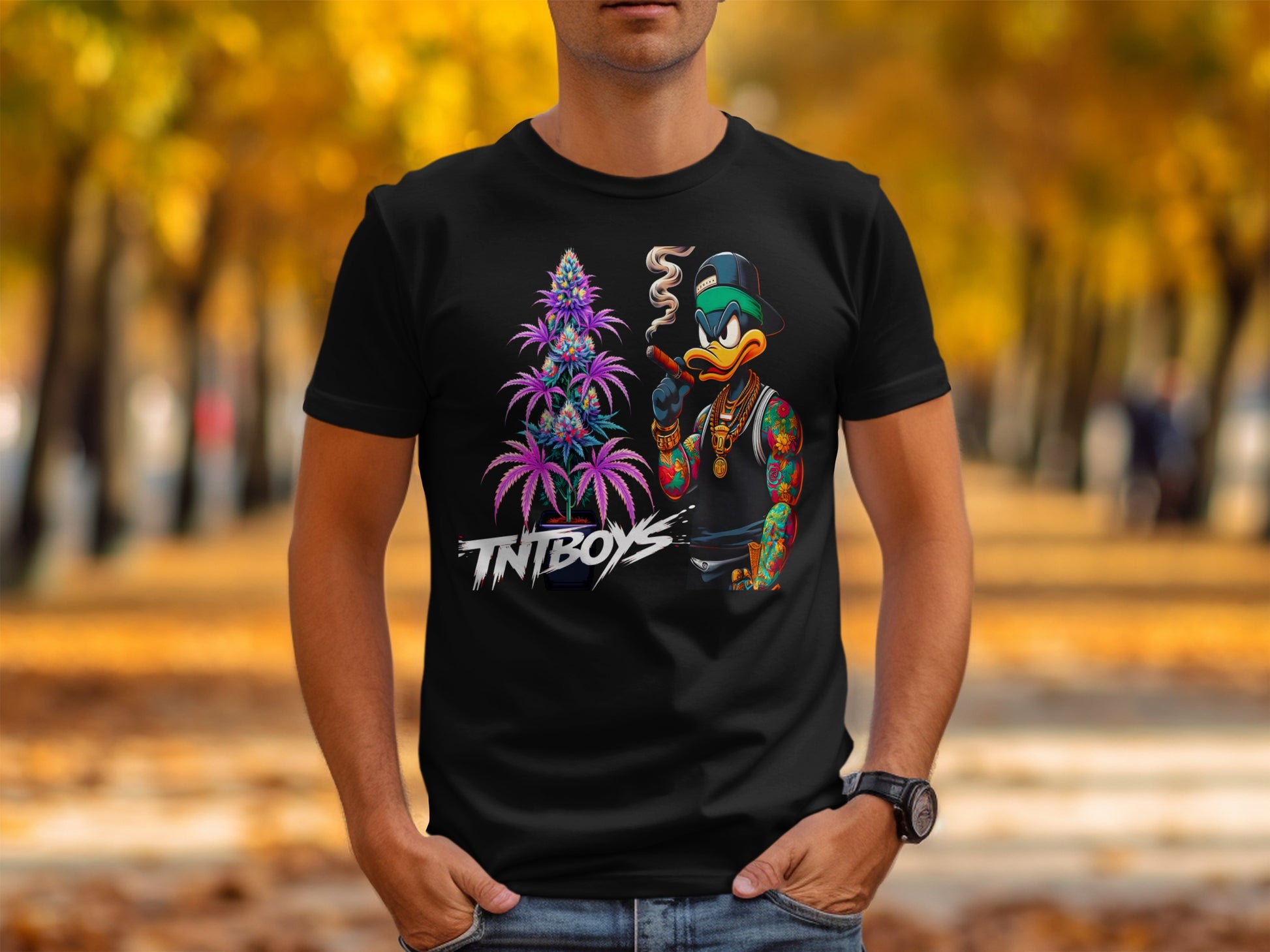Black t-shirt with TNTBOYS logo and cartoon character smoking a joint.