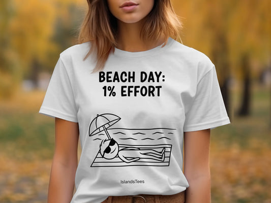 White t-shirt with "Beach Day: 1% Effort" graphic of person relaxing.