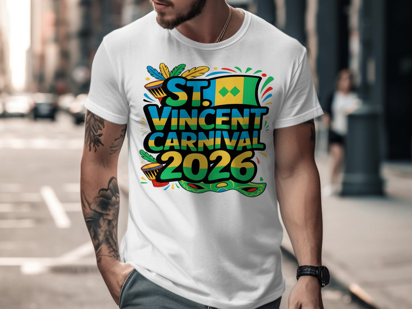 T-shirt with "St. Vincent Carnival 2026" text, flags, feathers, and mask.