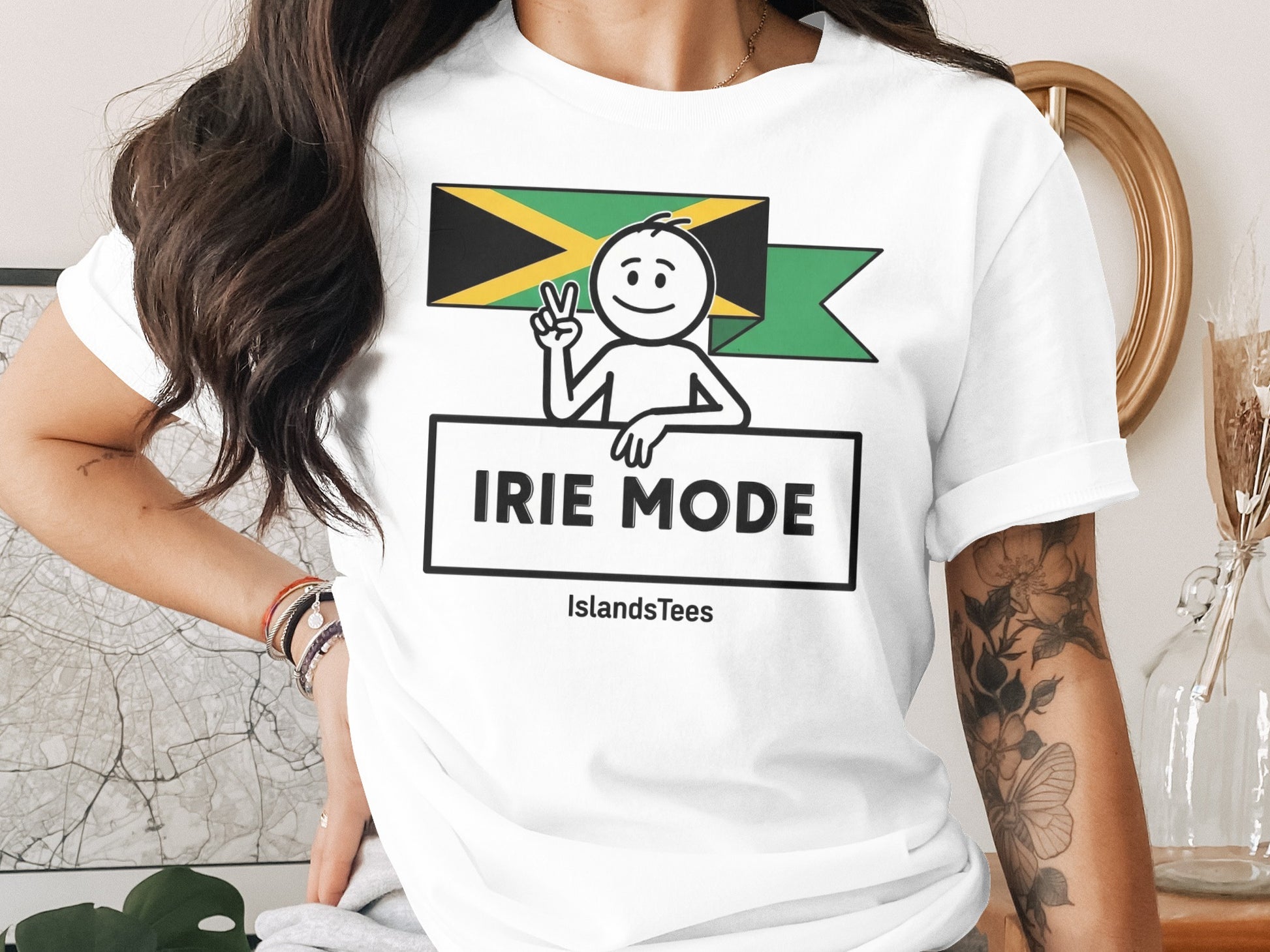 White t-shirt with "IRIE MODE" text and Jamaican flag symbol.