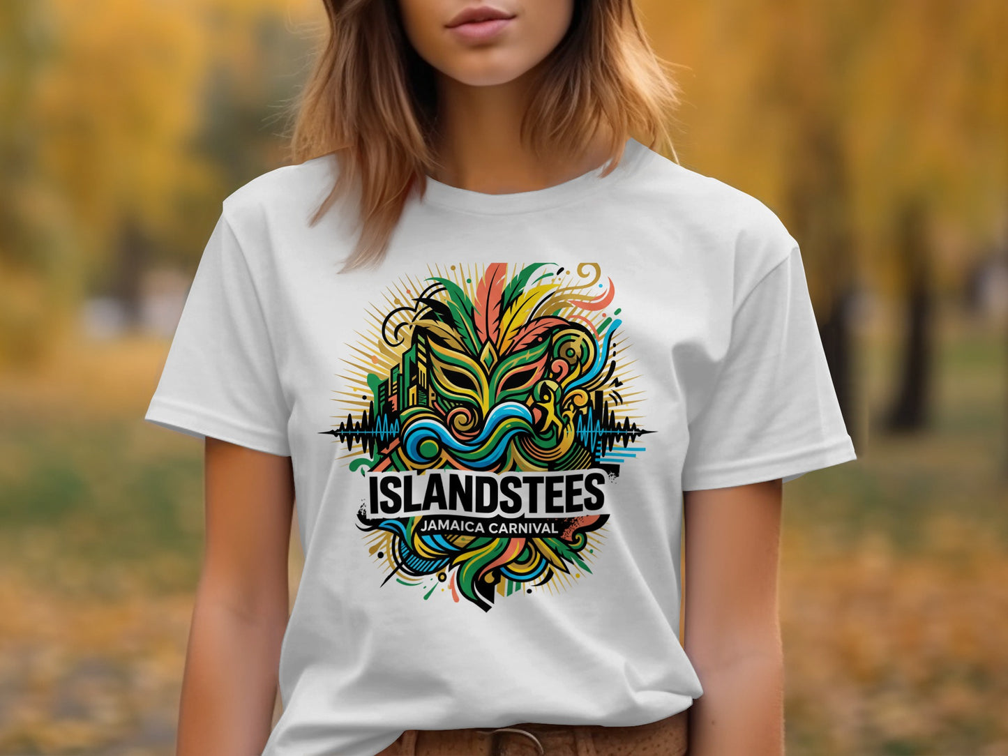 White t-shirt with "ISLANDSTEES JAMAICA CARNIVAL" and colorful mask design.
