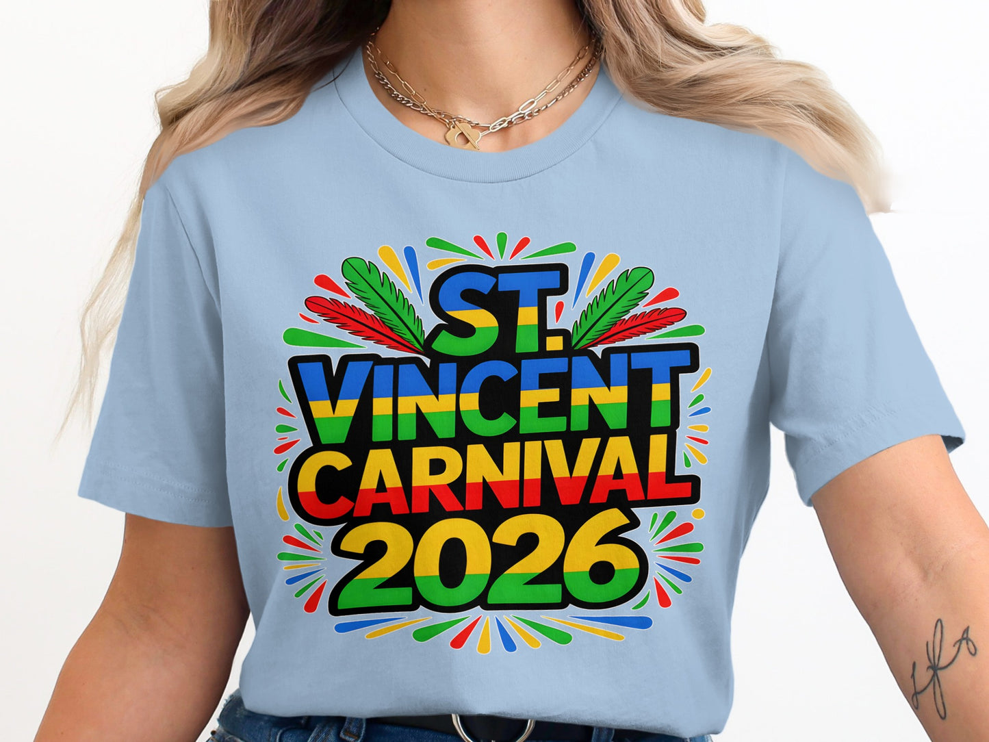 Light blue t-shirt with "St. Vincent Carnival 2026" in colorful text and feathers.