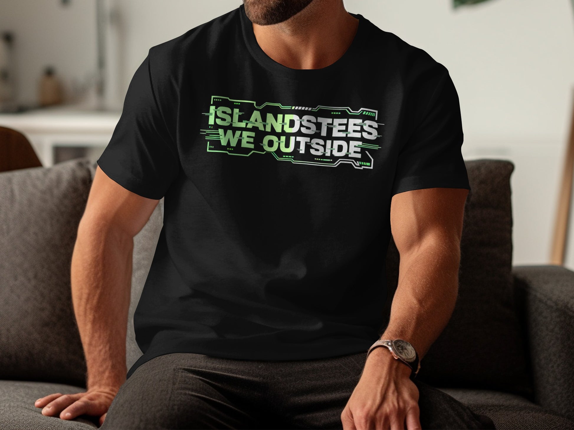 Black t-shirt with neon green "ISLANDSTEES WE OUTSIDE" text, worn by a man.