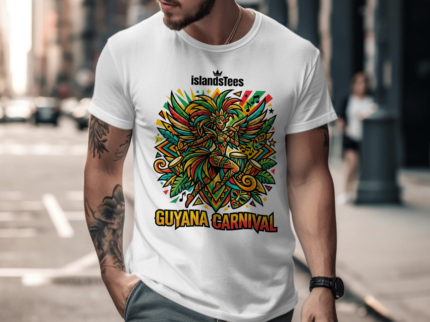 White t-shirt with colorful "Guyana Carnival" graphic featuring a winged figure.