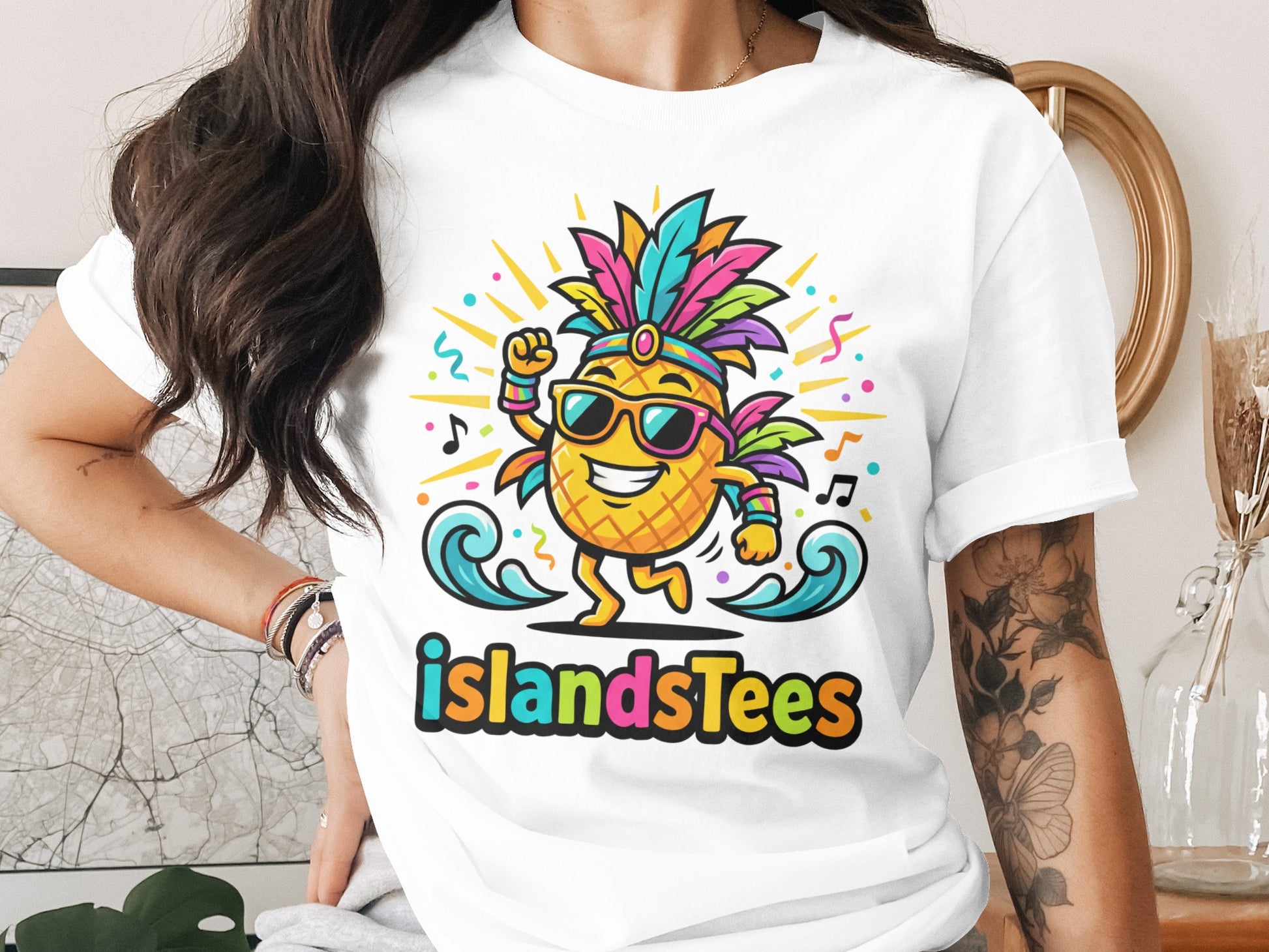 Cartoon pineapple wearing sunglasses and headdress on IslandsTees shirt.