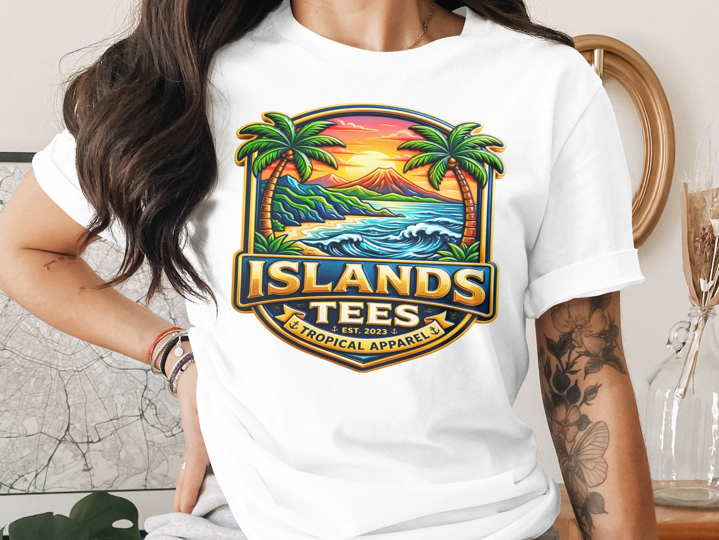 Islands Tees Tropical Apparel logo with beach, ocean, and volcano scene.