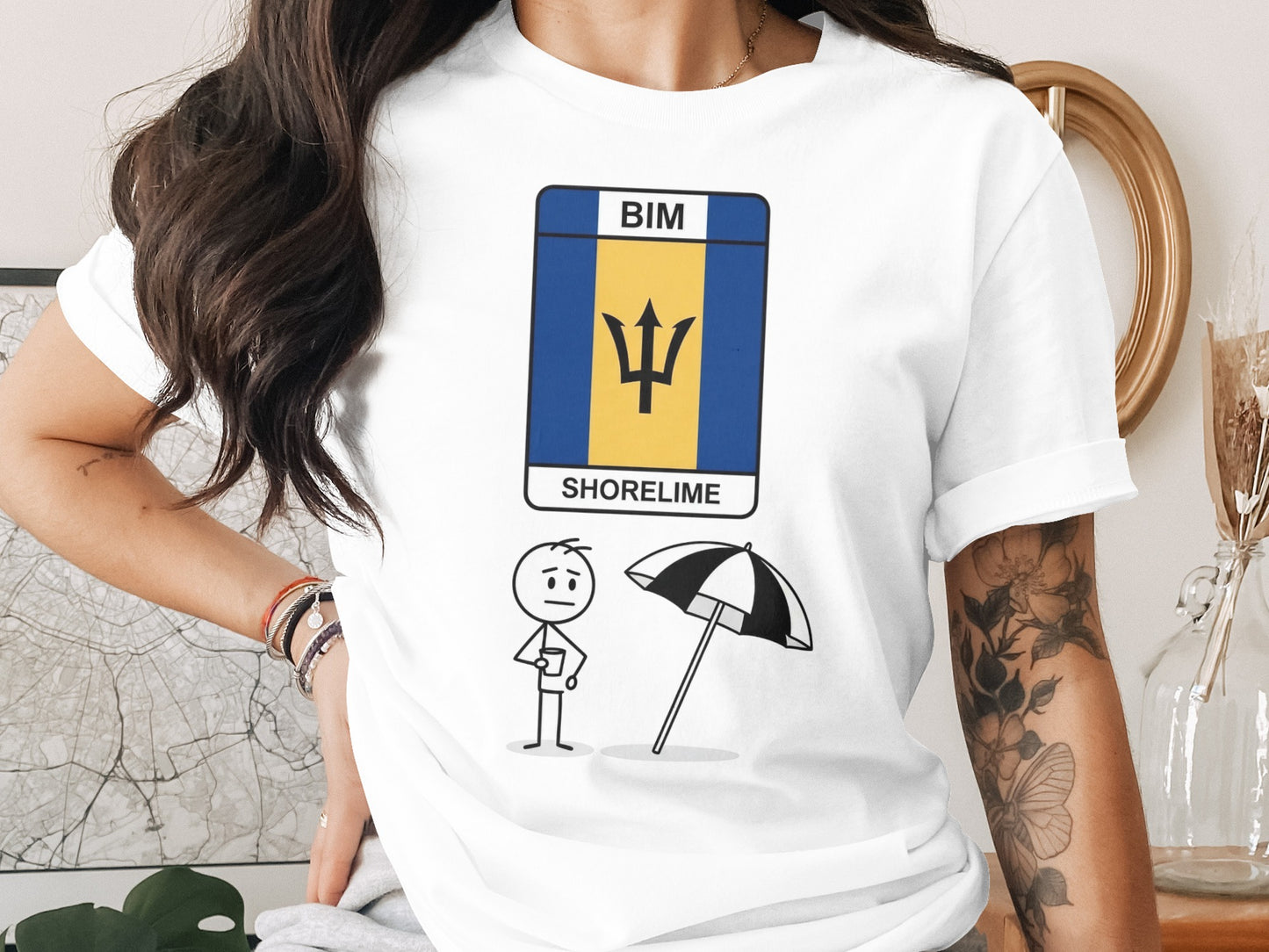 T-shirt with Barbados flag, stick figure, and umbrella graphic.