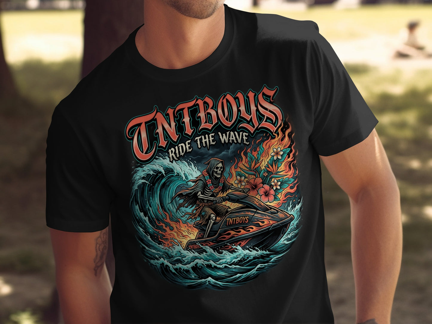 Black t-shirt with graphic of Grim Reaper riding jet ski through wave, "TNTBOYS" and "RIDE THE WAVE" text.