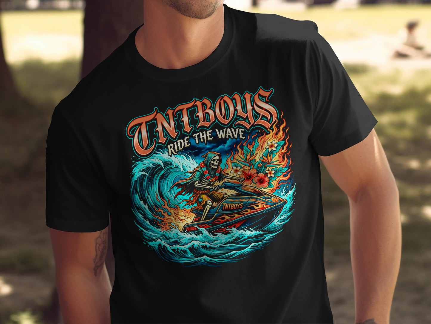 Black t-shirt with TNT BOYS RIDE THE WAVE graphic featuring a skeleton on a jet ski.
