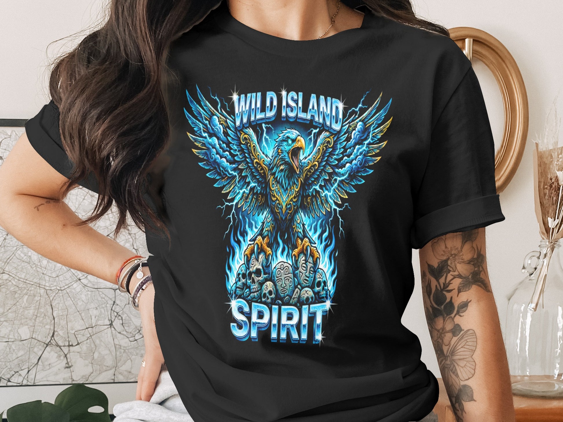 Black t-shirt with a blue and gold eagle soaring over skulls and flames.