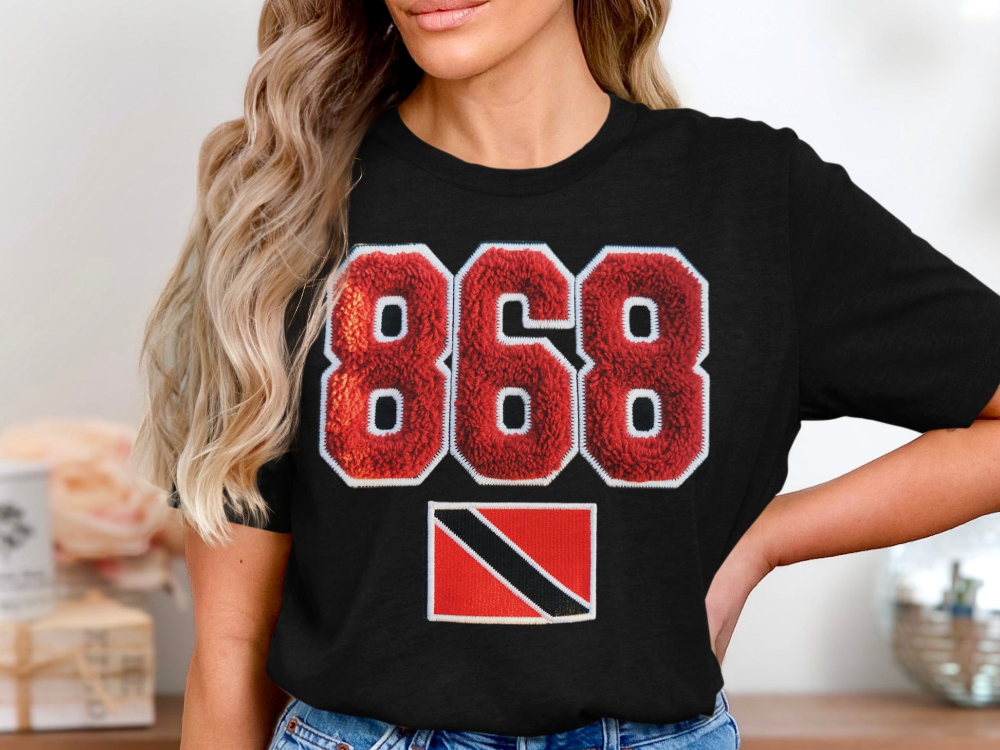 Black t-shirt with large red 868 and Trinidad and Tobago flag.