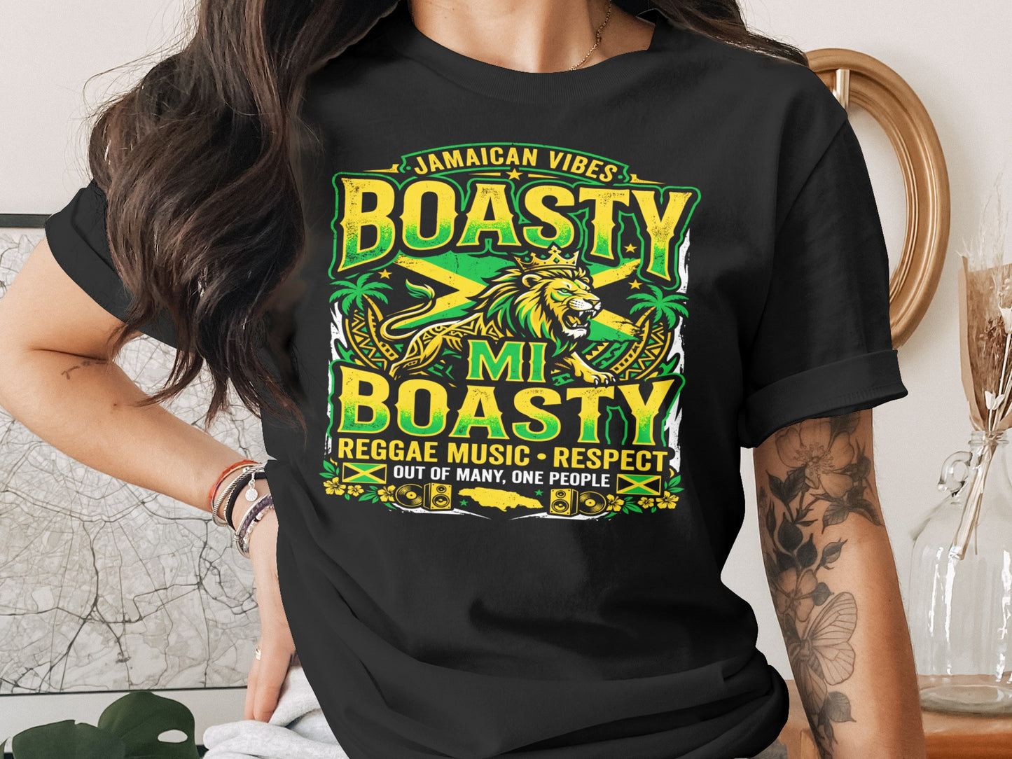 Black t-shirt with "Jamaican Vibes" and "Boasty Mi Boasty" text, lion graphic.