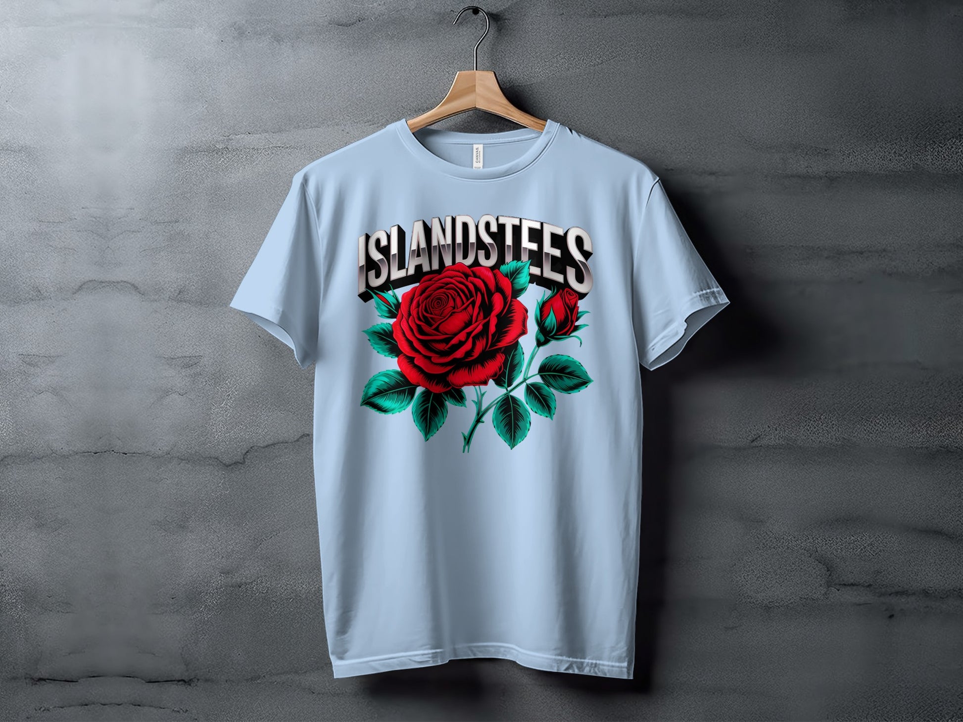 Light blue t-shirt with "ISLANDSTEES" and a large red rose graphic.