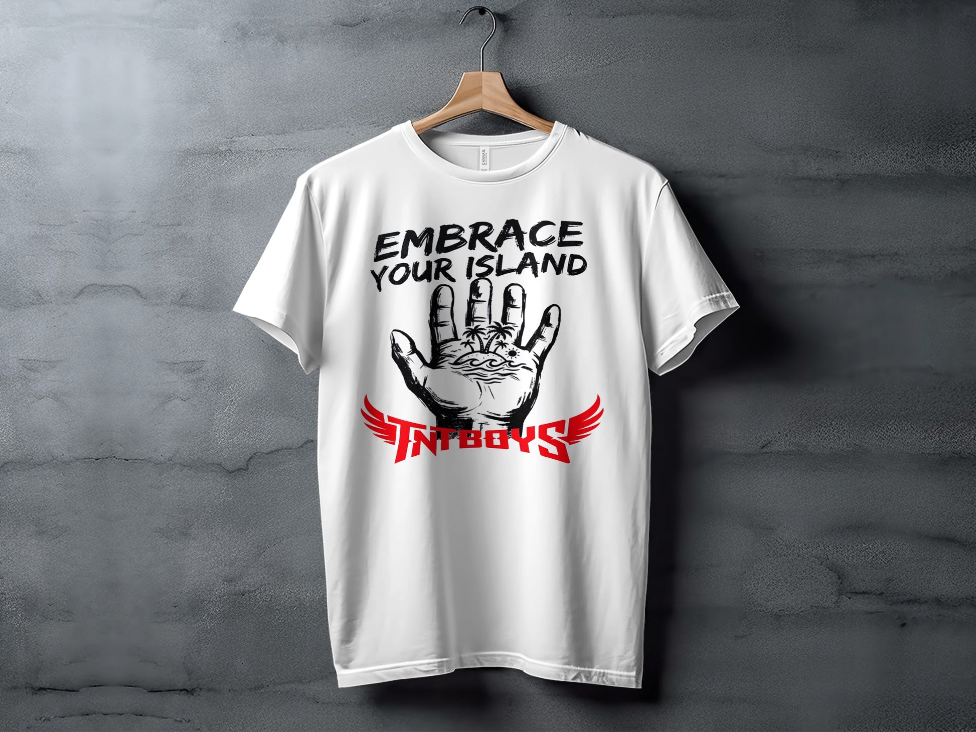 White t-shirt with "EMBRACE YOUR ISLAND" and winged TNTBOYS logo.