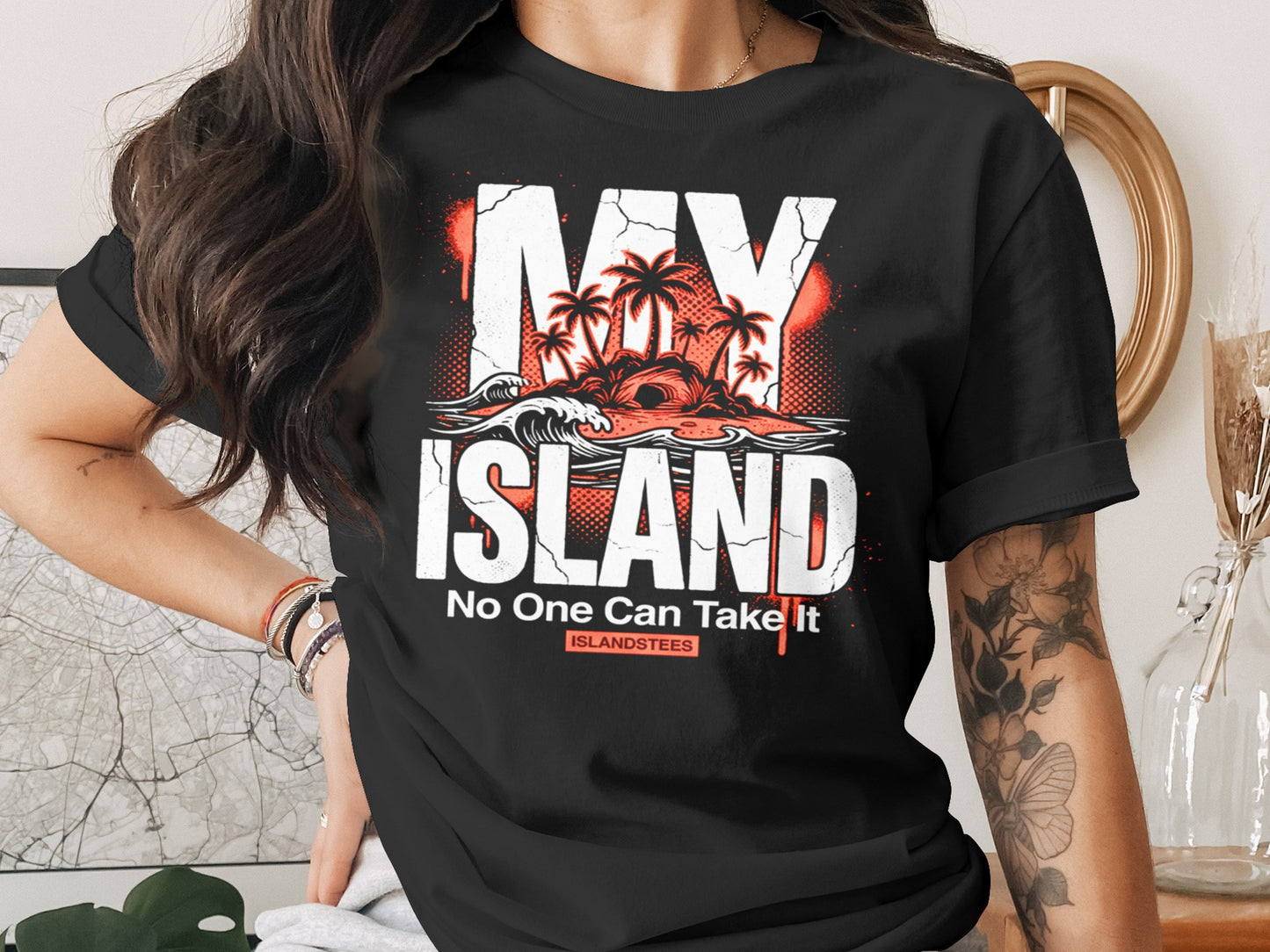 Black t-shirt with "MY ISLAND" text, palm trees, and a wave.