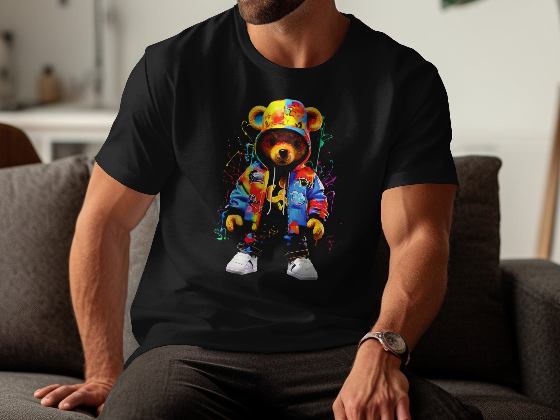 Black t-shirt with colorful graffiti-style teddy bear wearing a hoodie and jacket.