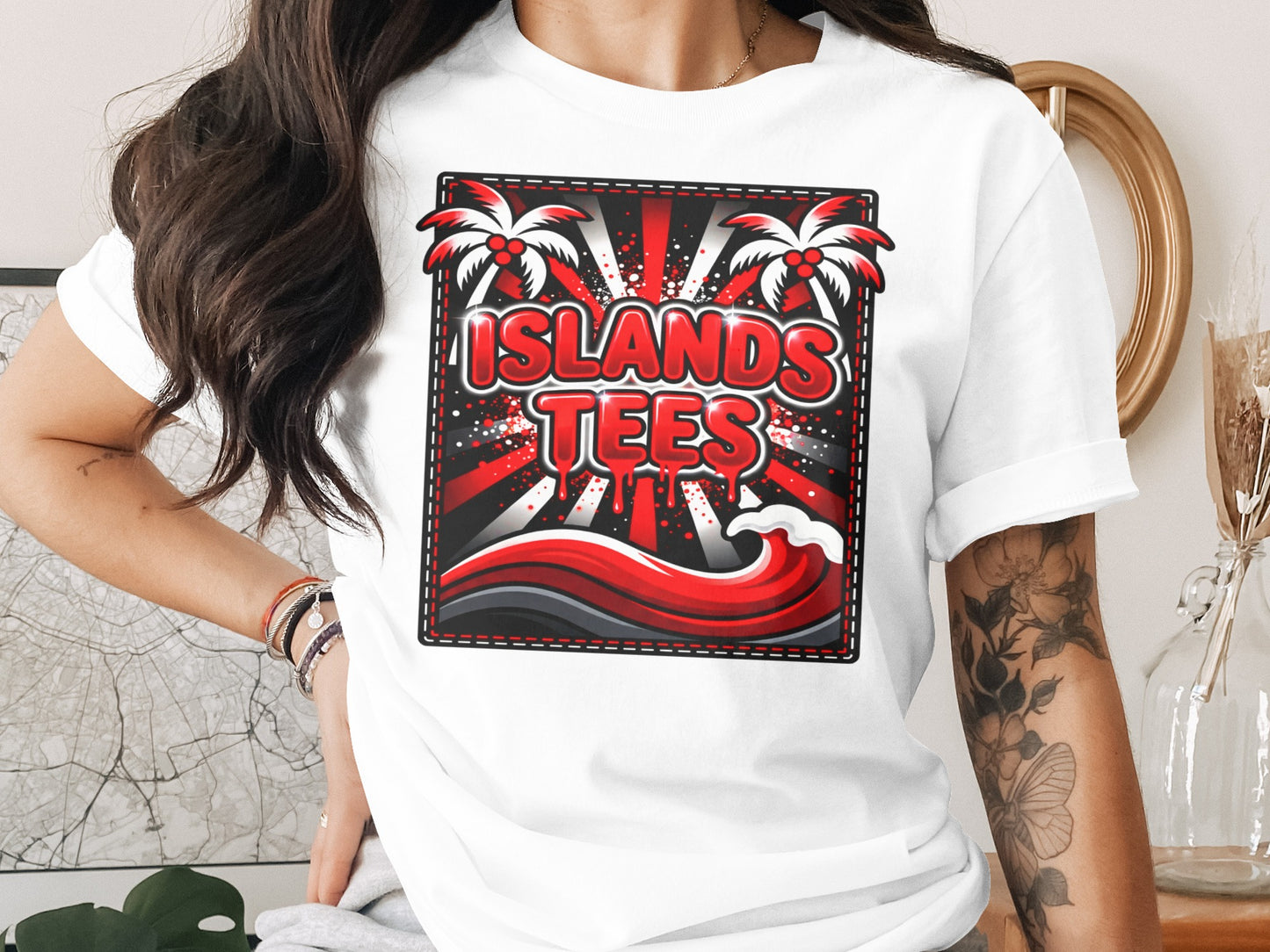 White t-shirt with "Islands Tees" logo featuring palm trees and waves.