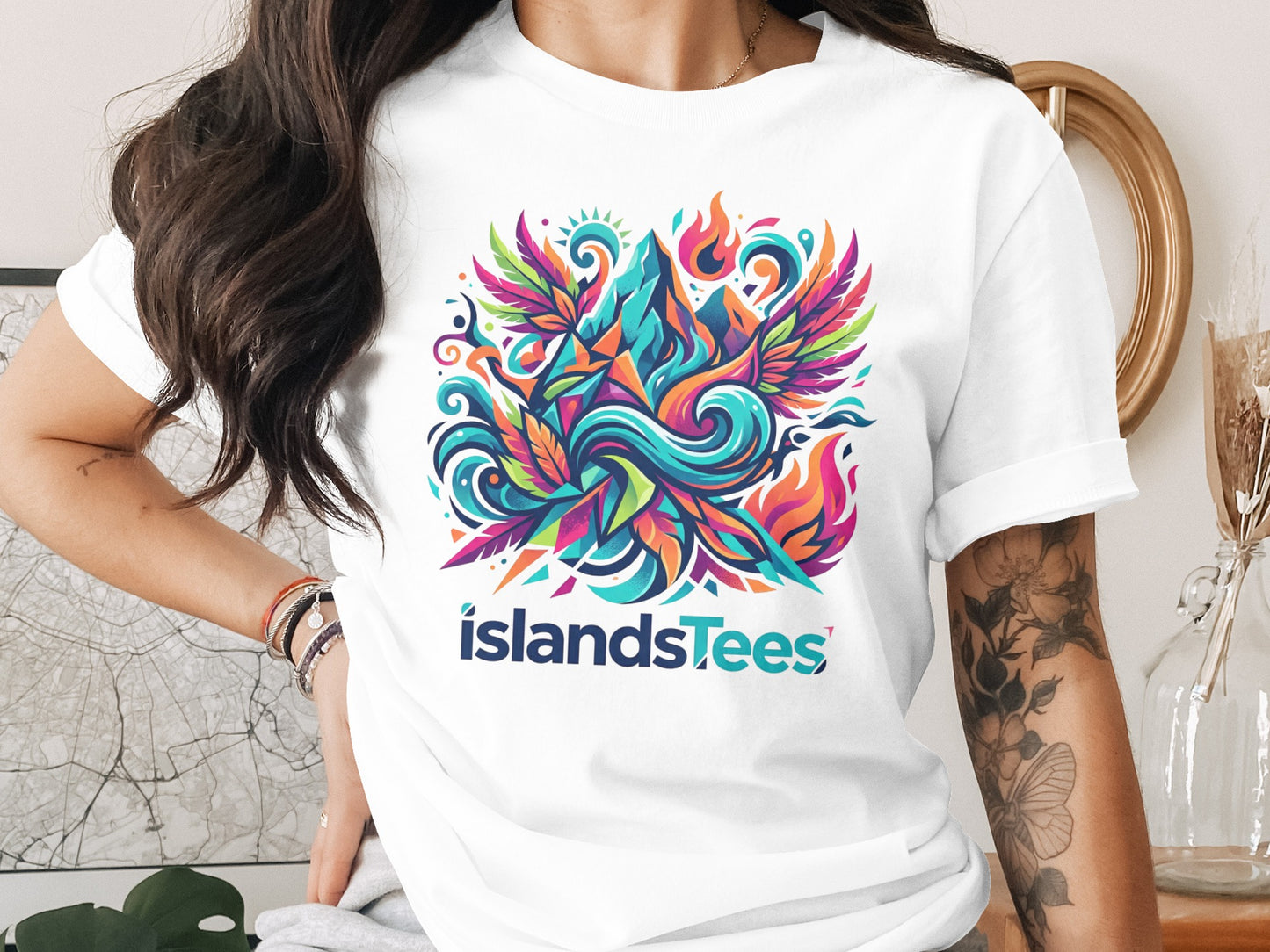 Colorful phoenix design with "islandsTees" logo on a white t-shirt.