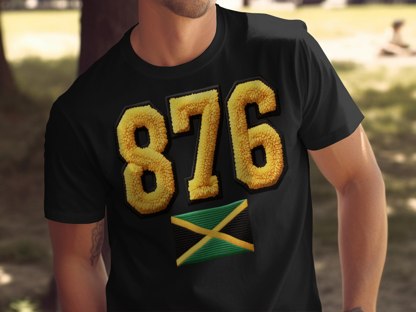 Black t-shirt with "876" and Jamaican flag design.