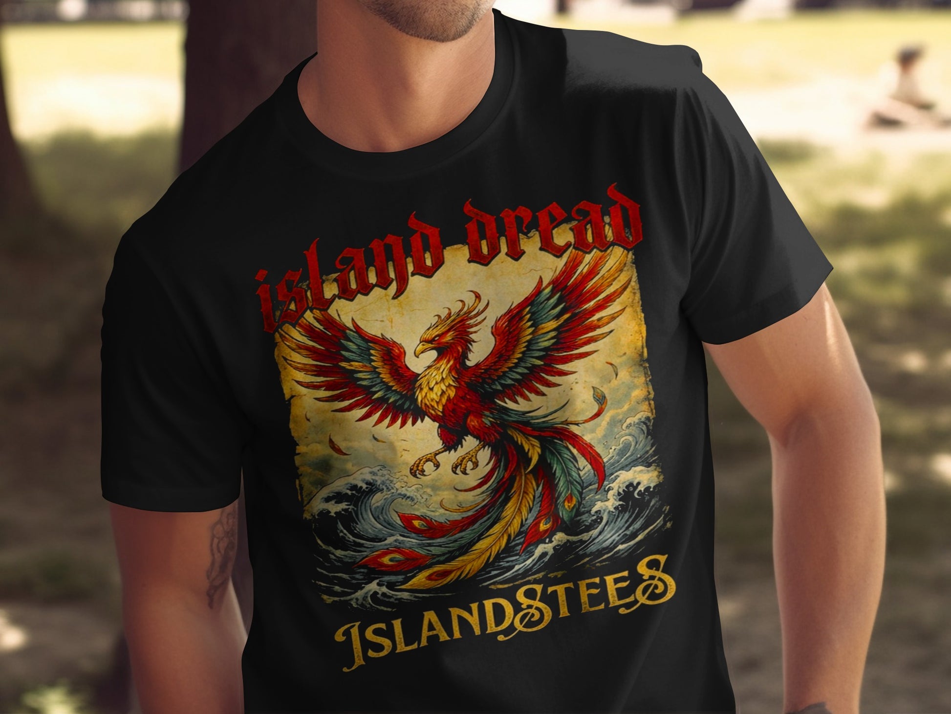 Black t-shirt featuring a colorful phoenix rising from waves, with text "Island Stees".