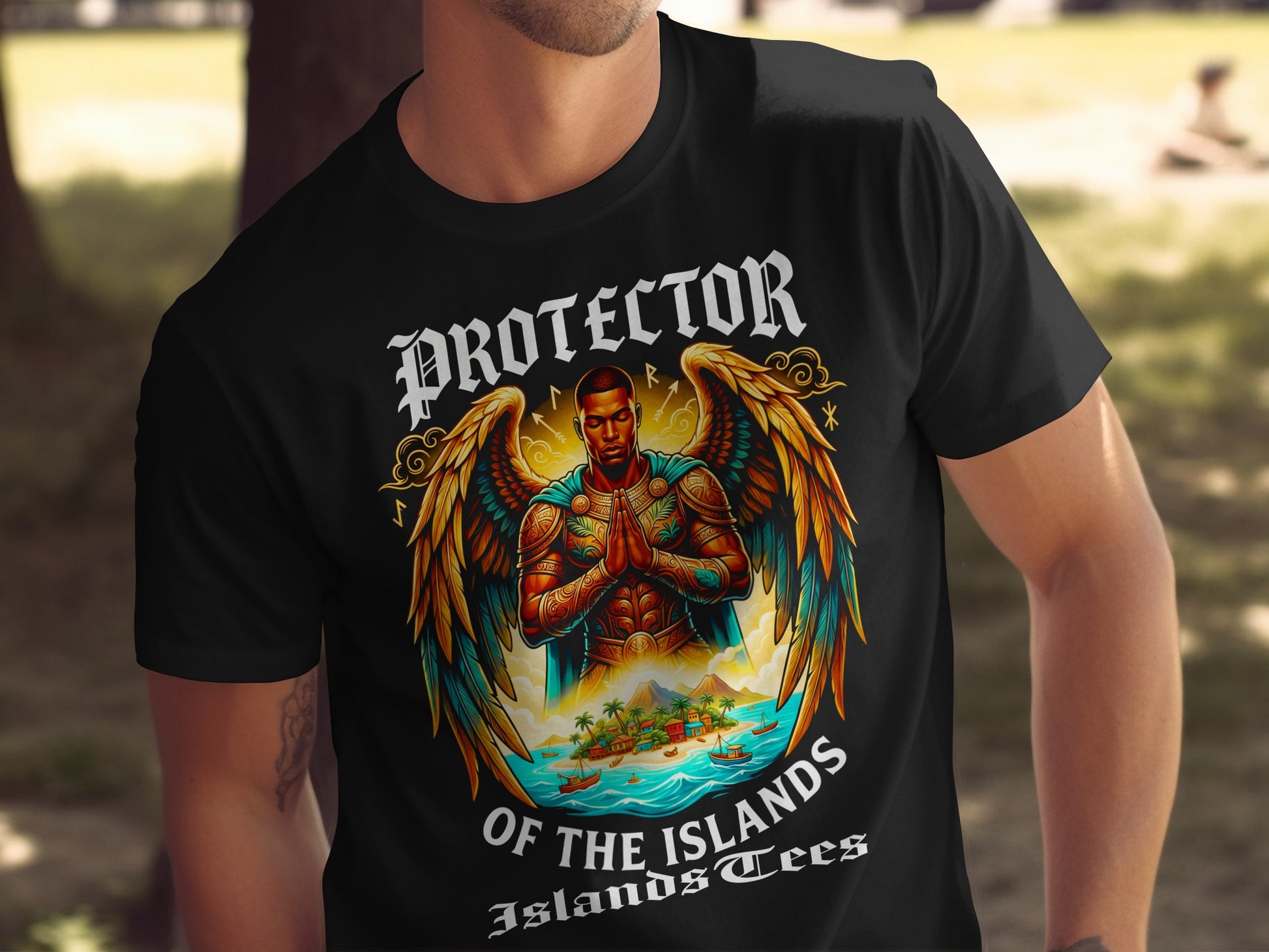 Black t-shirt with an angel in a tropical island setting and text "Protector of the Islands".