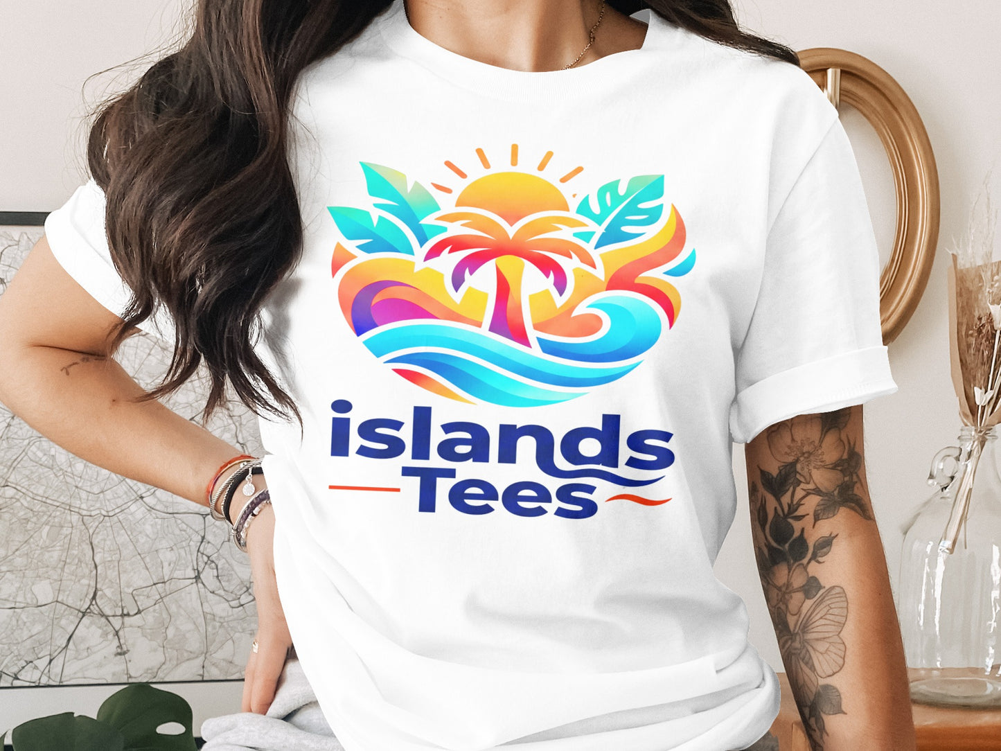 White t-shirt with colorful "Islands-Tees" logo featuring a sun, palm tree, and waves.