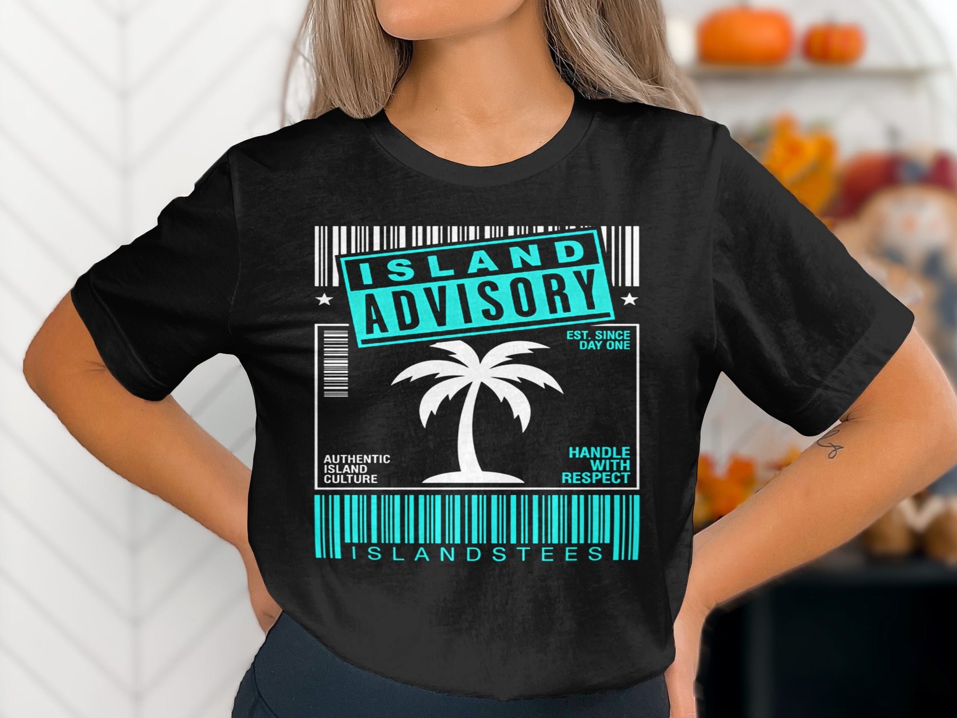Black t-shirt with "Island Advisory" and palm tree graphic.