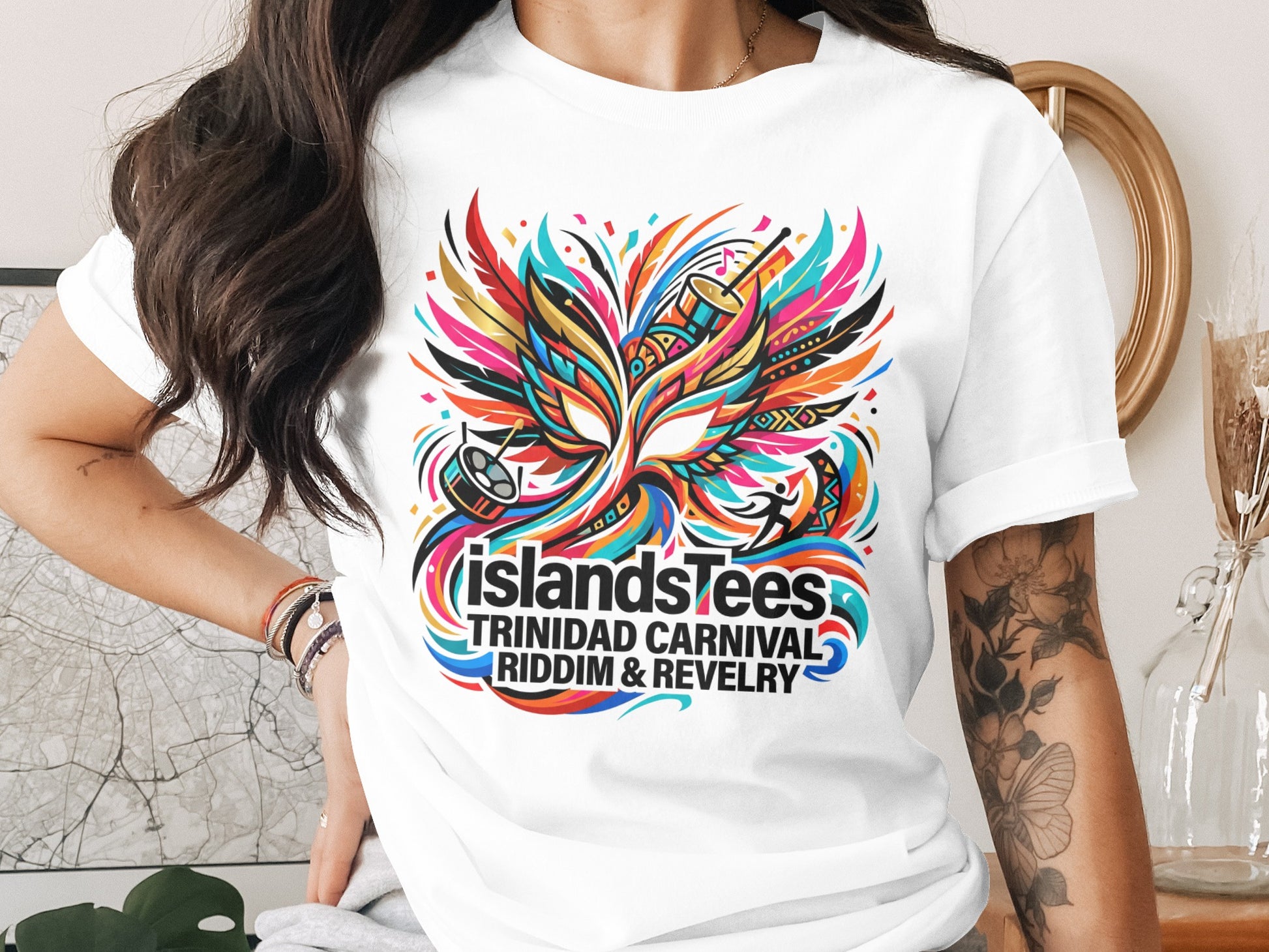 T-shirt with colorful "IslandsTees Trinidad Carnival Riddim & Revelry" mask design.