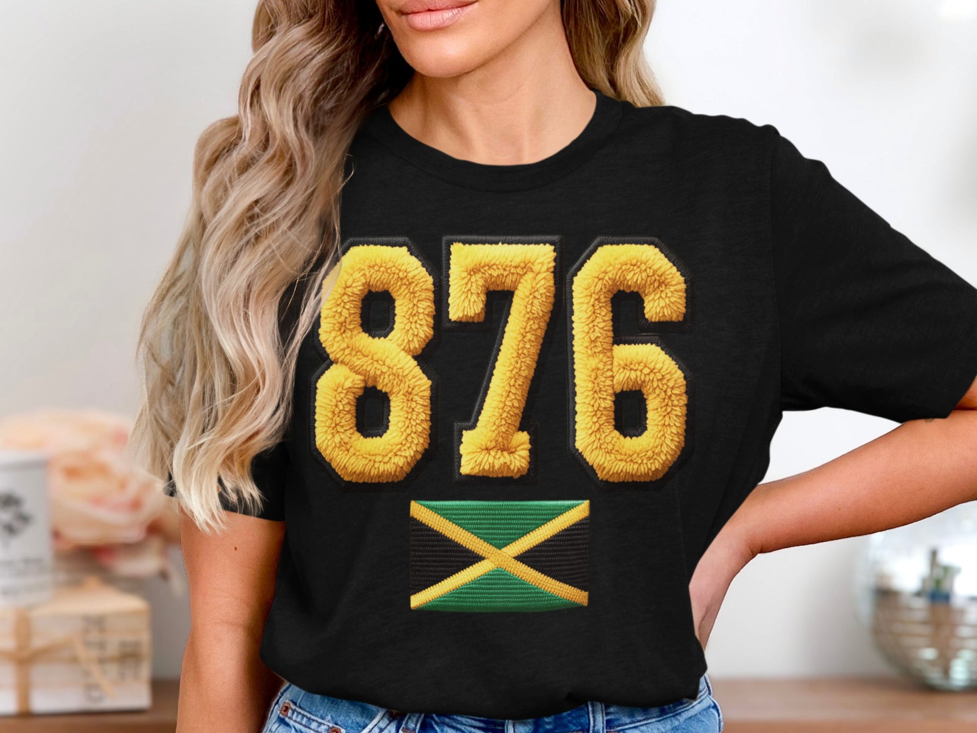 Black t-shirt with yellow fluffy "876" and Jamaica flag.