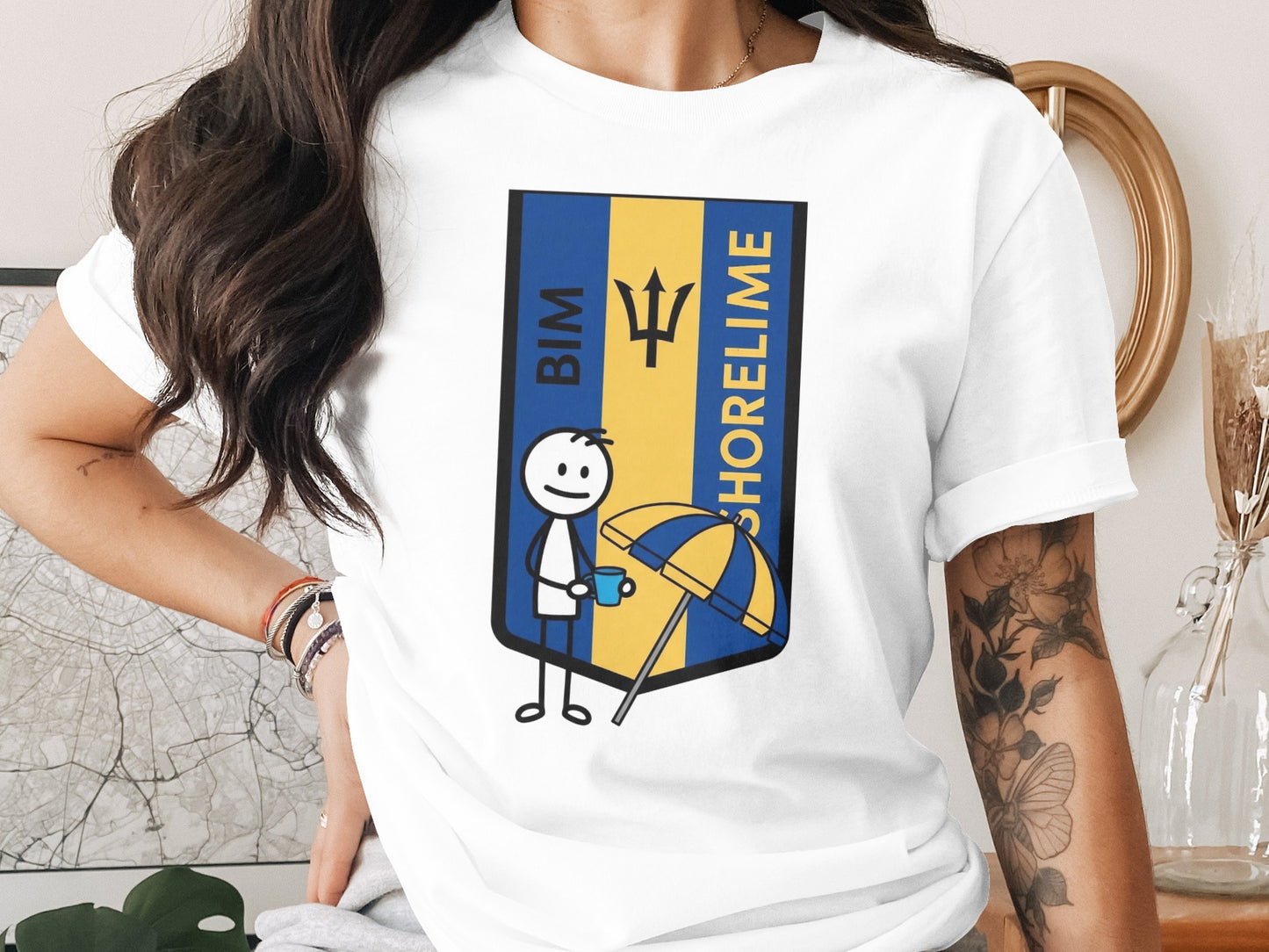 White t-shirt with stick figure holding umbrella and BIM SHORELINE logo.