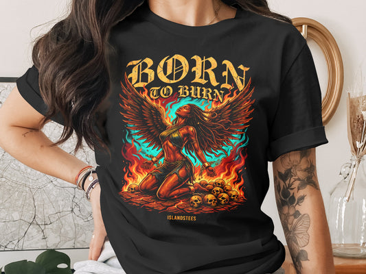 Black t-shirt with "BORN TO BURN" text and winged woman kneeling among skulls.