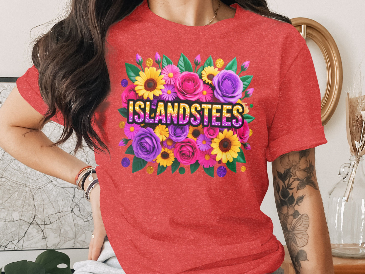 Red t-shirt with colorful floral design and "ISLANDSTEES" text.