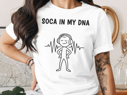 Woman wearing a white t-shirt with "Soca in My DNA" and a stick figure with headphones.