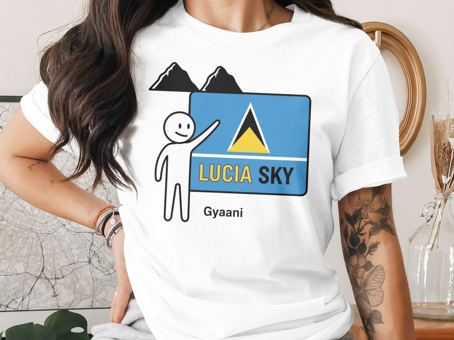 White t-shirt with "LUCIA SKY" and Saint Lucia flag graphic.