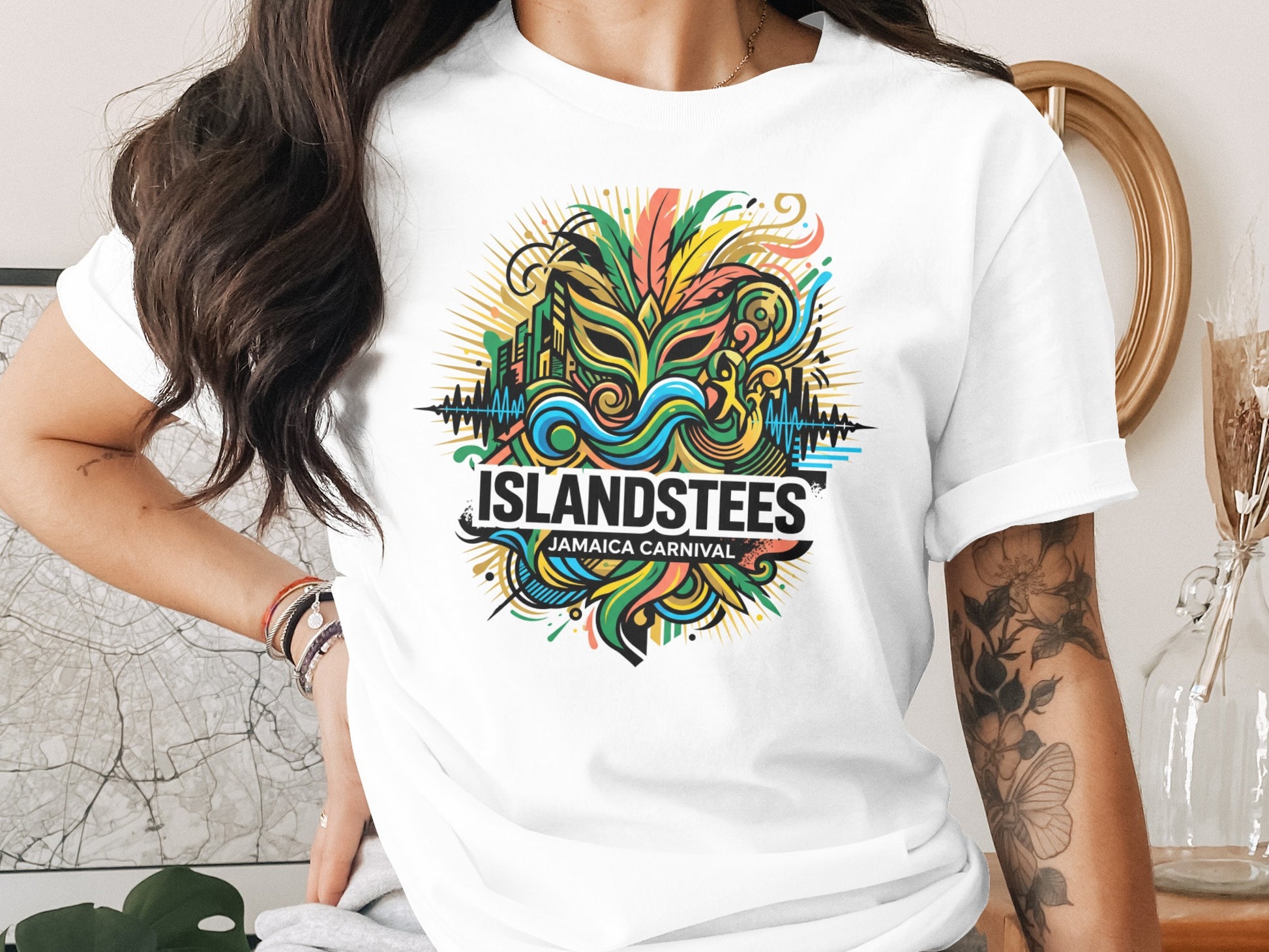 White t-shirt with colorful "Islandstees Jamaica Carnival" graphic design.