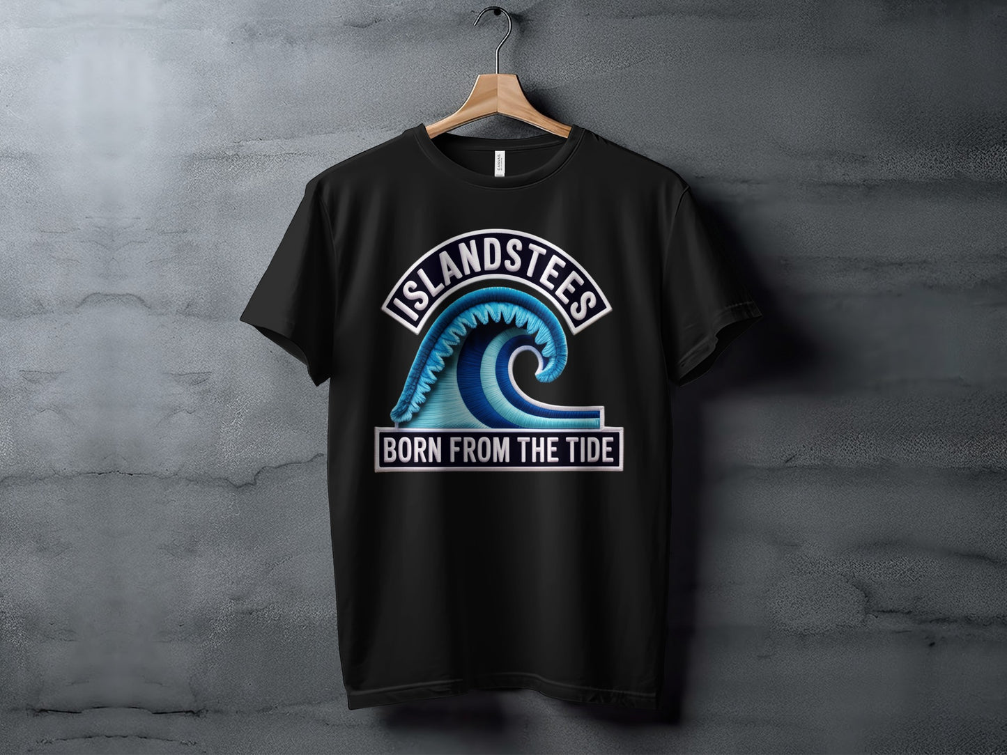 Black t-shirt with a wave graphic and "Islandstees Born From The Tide" text.