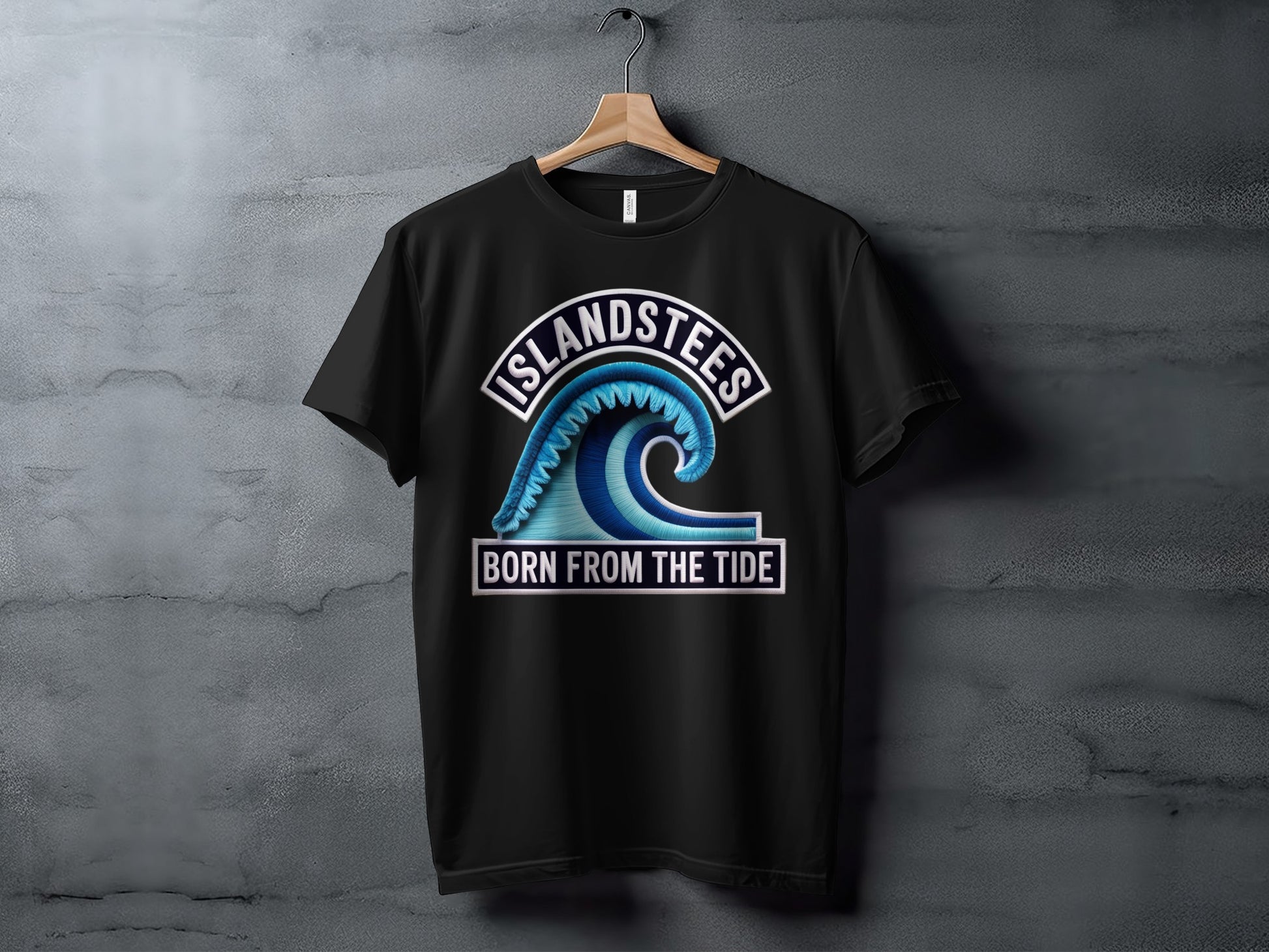 Black t-shirt with a wave graphic and "Islandstees Born From The Tide" text.