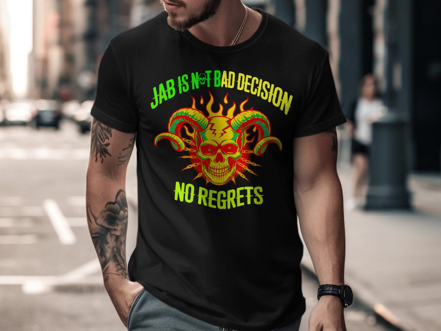 Black t-shirt with green and yellow text and a red skull with horns graphic.