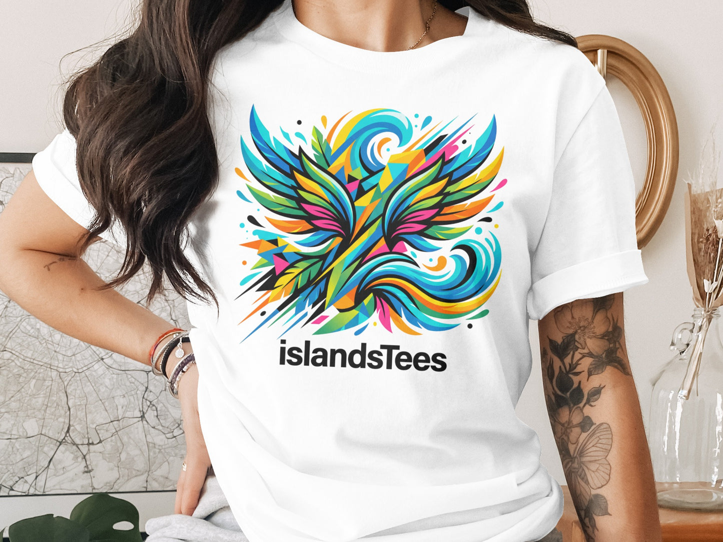 Colorful abstract bird design on a white t-shirt.