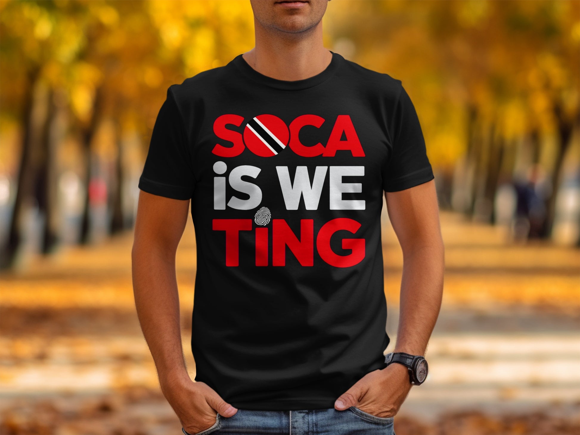 Black t-shirt with red and white "SOCA IS WE" text and Trinidad and Tobago flag.